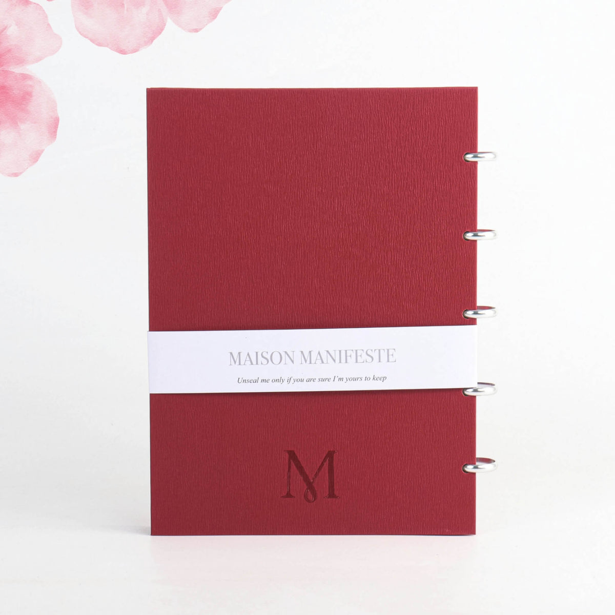 Back cover of the Burgundy A4 (8.27 x 11.69 in) discbound notebook: belly band, embossed 'M' monogram