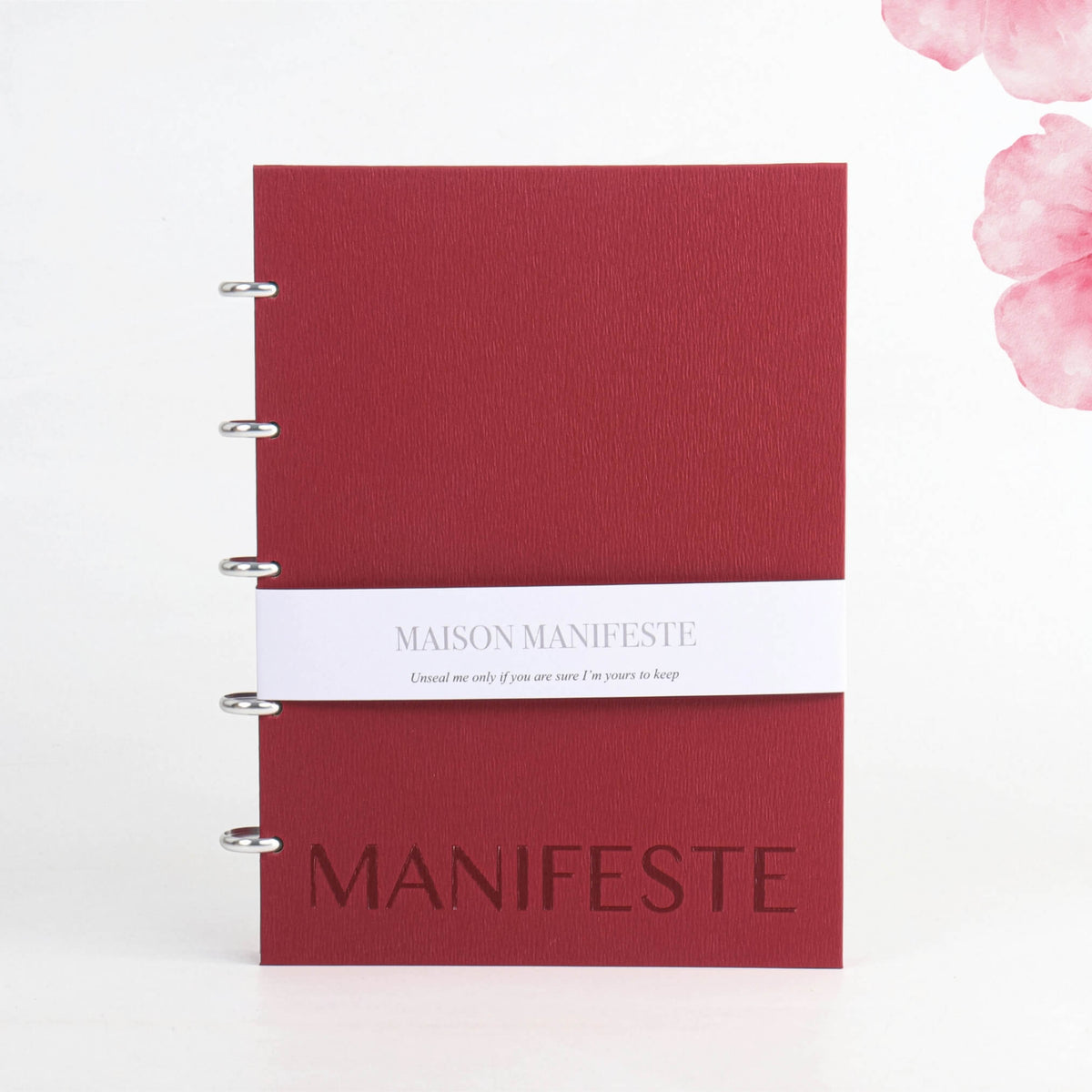 Burgundy A4 (8.27 x 11.69 in) discbound notebook front cover: belly band, embossed MANIFESTE wordmark