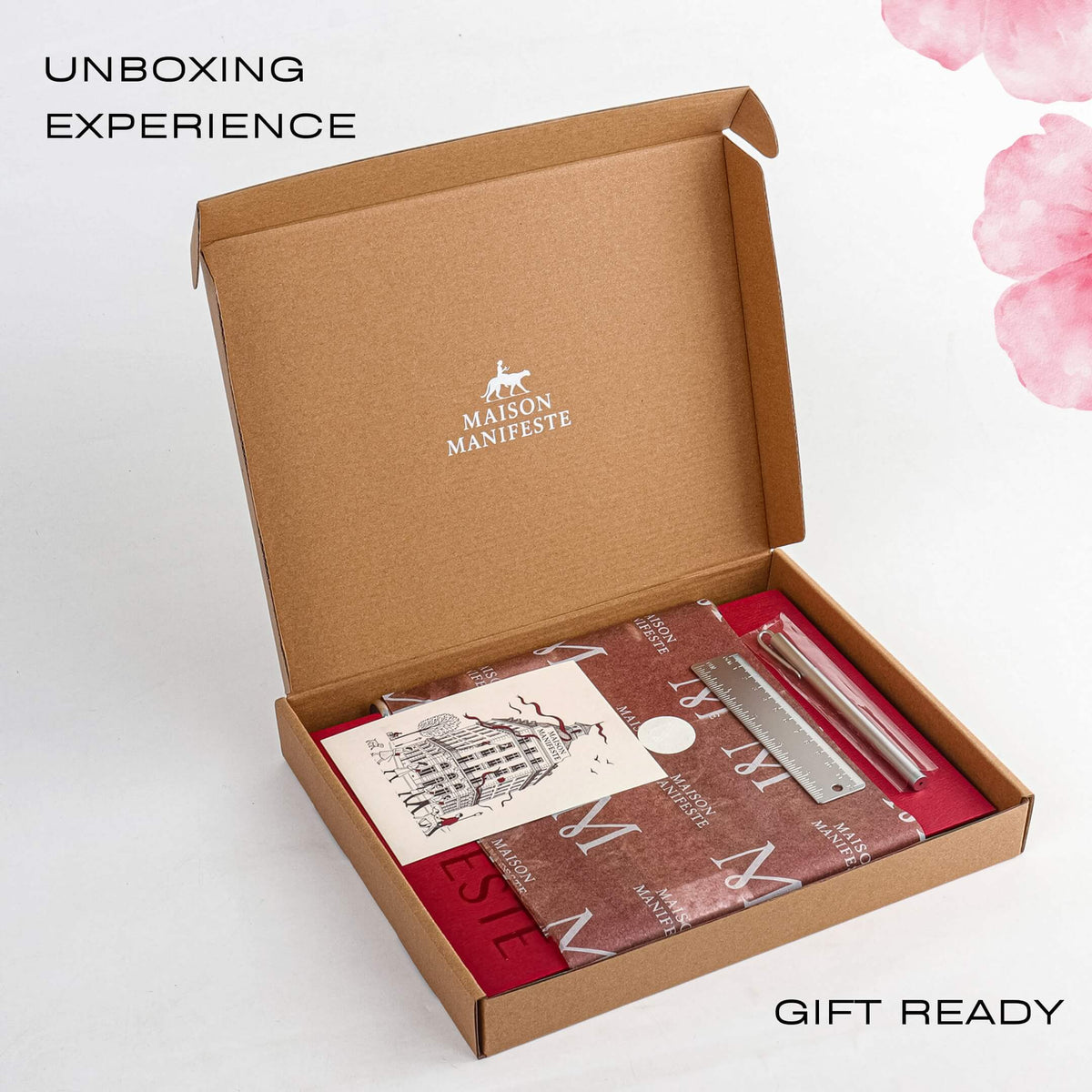 Unboxing Experience marketing graphic showing the open Maison Manifeste shipping box