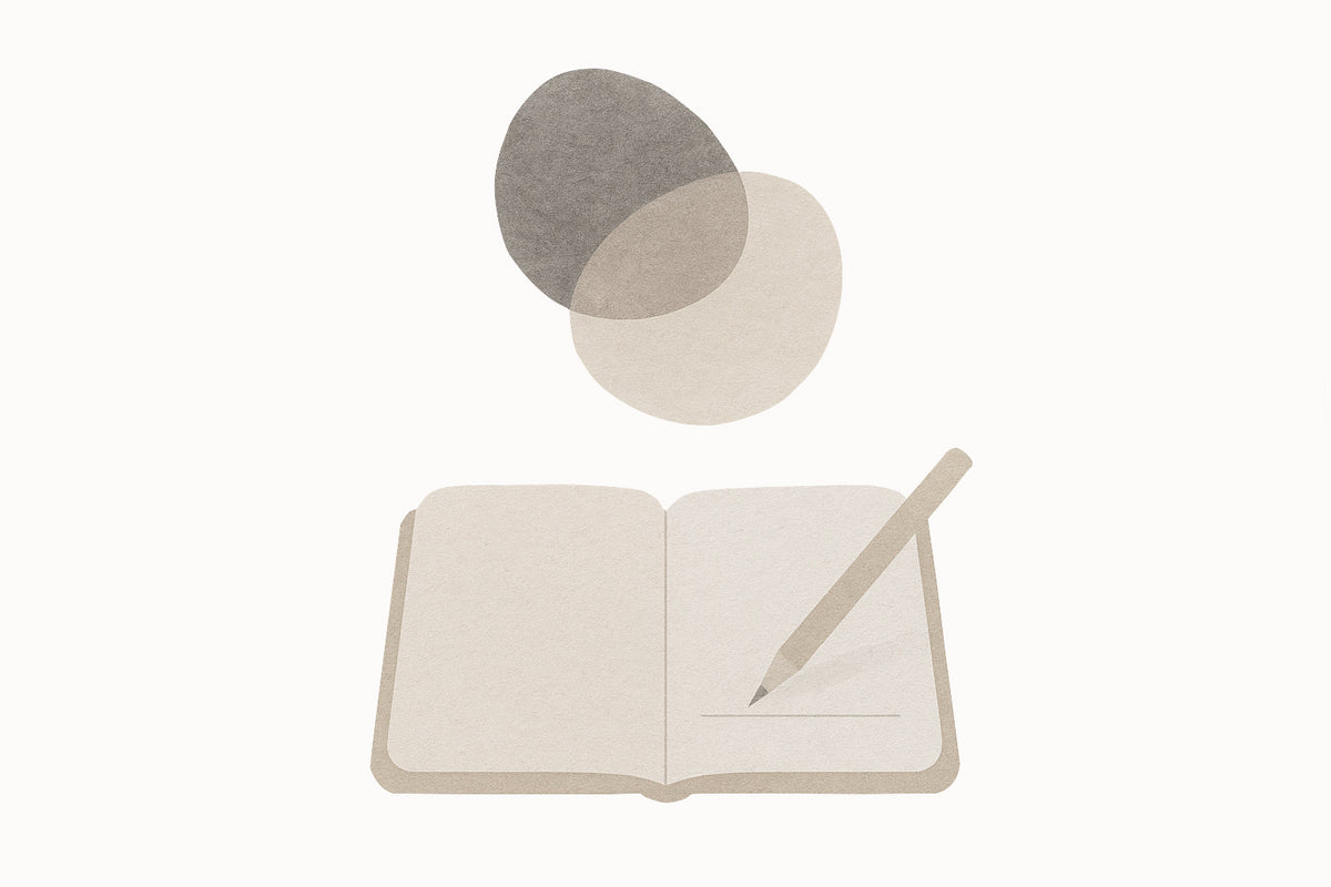 Watercolor illustration of an open notebook with a pencil writing, beneath two overlapping abstract circles